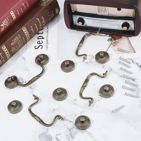 Four 3.6 Inch Vintage Bail Pull Handles Antique Bronze Furniture Hardware Set with screws on marble surface
