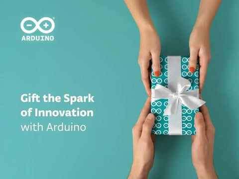 Gift box wrapped in Arduino-themed paper with a white ribbon, exchanged between two people, background showing Arduino logo.