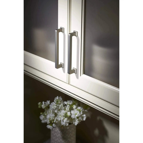 Top Knobs TK703HB Ascendra Three And Three Quarters Inch Center To Center Cabinet Pull Honey Bronze on white cabinetry