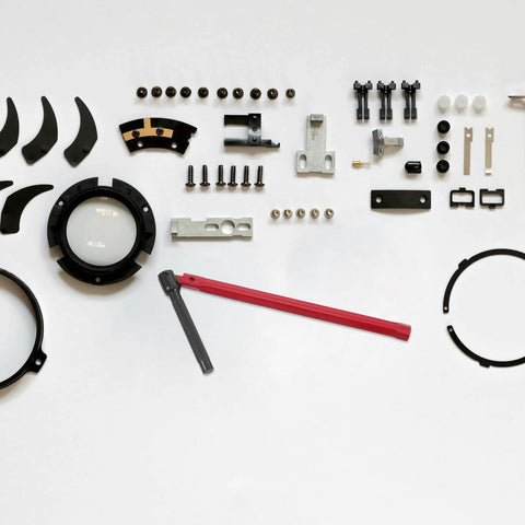 Assorted plumbing tool parts including a red and black adjustable wrench for 8-13mm ratcheting spanners