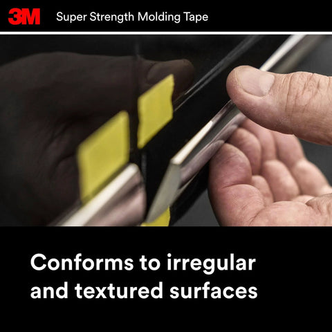 Person applying Heavy-Duty Automotive Molding Tape 7/8 Inch Wide By 15 Feet, Double-Sided Foam Adhesive For Slapping On Trim, Moldings And Emblems on a vehicle.