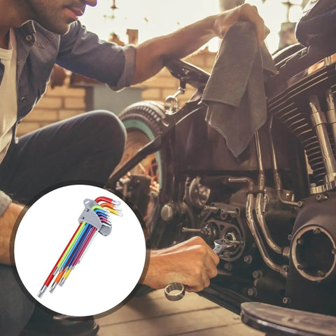 Mechanic using 9 Piece Colored Star Hex Wrench Set With L Shaped Long Arm Heavy Duty Steel Spanner Tools For Mechanical And Industrial Use Pro Grade Handy Multi Function Repair Kit For Auto Machinery And Home Projects on motorcycle engine