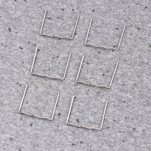 Car Bumper Staples Kit For Auto Body Repair 500Pcs Pre Cut Wave Staples For Hot Stapler Welding shown on a gray surface