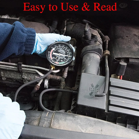 VECKYJL vacuum gauge automotive tester kit held by a gloved hand under the car hood in the engine bay