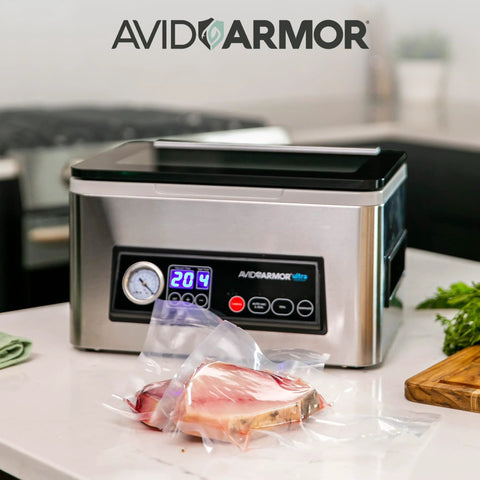 Avid Armor vacuum sealer USV20 on kitchen counter; stainless steel body, 11.5-inch seal bar.