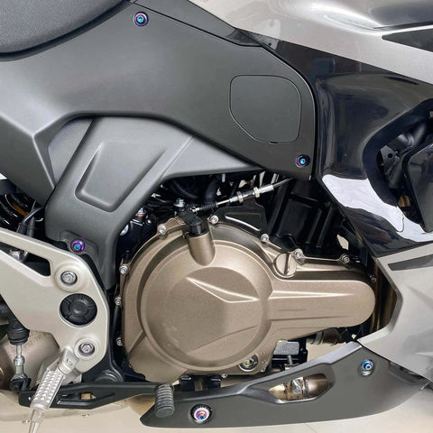 Side view of a motorcycle engine with ✝️ BAIONE Fairing Bolt Kit 195PCS Stainless Steel M5 M6 screws installed on a sportbike
