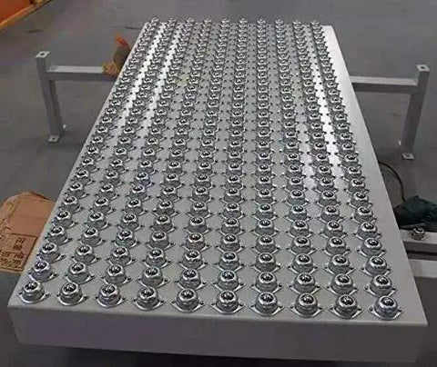 Sixteen Piece Five Eighth Inch Ball Transfer Bearings Set Flange Mounted Carbon Steel Heavy Duty 360 Degree Rotation Units on table