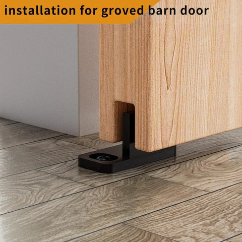 4 Pieces Barn Door Floor Guide Set For Sliding Closet Doors POM Plastic Bottom Track Guide Wall Mounted Adjustable For Grooved And Non Grooved Doors Includes Bypass Pocket And Screws Matte Black installed view