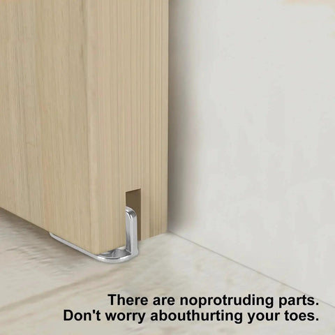 Four Barn Door Floor Guide Bearings With Adjustable Bottom Rollers installed on wooden barn door with steel frame for silent smooth operation