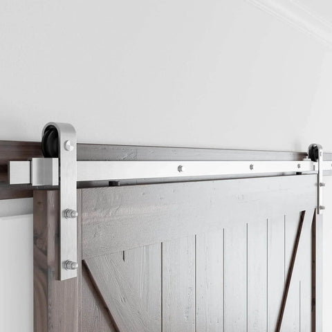 Close-up of 10 Feet Brushed Nickel Barn Door Hardware Kit installed on wooden door, showing heavy-duty sliding track and J Shape hanger