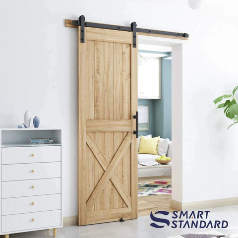 5 FT Heavy Duty Sturdy Sliding Barn Door Hardware Kit, Black on wooden door, includes handle and floor guide, fits 28-30 inch door panel.