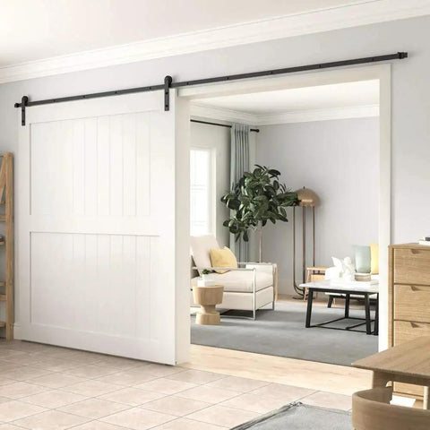 10 Foot Barn Door Hardware Kit For Single Sliding Door Heavy Duty Black Carbon Steel Track And J Shape Rail Includes All Necessary Hardware For Quick Smooth Installation For A 65 Inch Closet Panel No Door installed in a living room