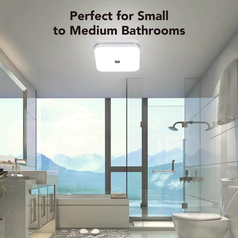 Quiet 100 CFM Bathroom Exhaust Fan With Light And 1.5 Sones installed in modern bathroom ceiling