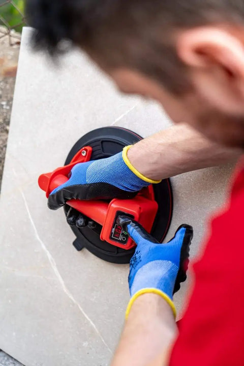 Professional using Battery Powered Tile Vacuum Suction Cup Tool for Handling Ceramic and Porcelain Tiles 220 mm Grip up to 140 kg