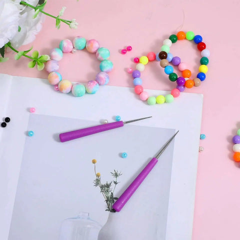2 Pack Bead Reamer Set with Purple Handles for Jewelry Making, shown with multicolored beads on a pink background