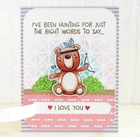 Cute bear-themed greeting card with "I Love You" message and heart accents, featuring playful bear illustration holding an arrow.