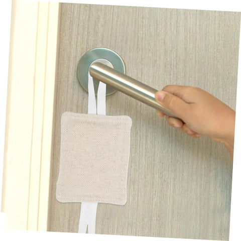 Reduce annoying door slams with this 3 pack of door silencers, a simple no drill installation shown on beige cushion attached to handle