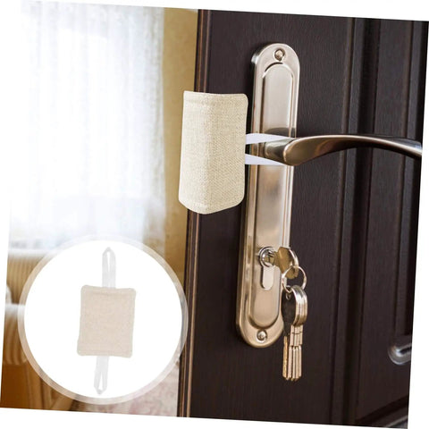 Silence noisy doors with this 3-pack of no drill door silencers shown on a beige cushioned pad installed on a door handle.