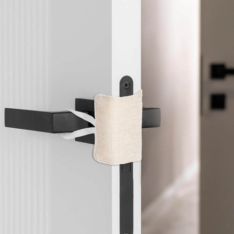 Installed beige 3 Pack Door Silencers For Slamming With Elastic Latch Covers, showing durable polyester material cutting down noise.
