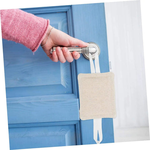 Three-piece, no-tool door silencers prevent finger pinches and door slam noise by snapping onto the door knob on a blue door.