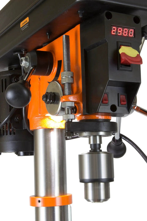 Close-up of a 12-Inch Benchtop Drill Press with 6.2-Amp Variable Speed Motor, featuring digital RPM readout and cast iron construction.
