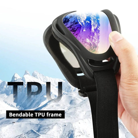 Hand bending TPU frame of 2 Pack Ski Goggles For Men Women Kids UV Protection Foam Anti Scratch Dustproof with reflection of snowy mountains.