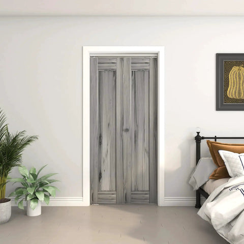 Installed view of a 36 Inch Bifold Door Hardware Kit For Two Doors In Aluminum Top Mounted Sliding Barn Door System in a bedroom.