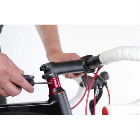 Person installing 1/8 inch bicycle headset ball bearing 45 degree 2RS sealed MH P08H7 for smooth steering on a bike.