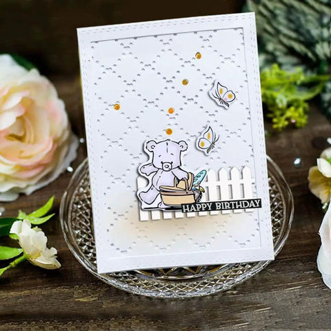 Greeting card with rhombus dot dotted background and bear design for card making and scrapbooking with grid embossed stencil.