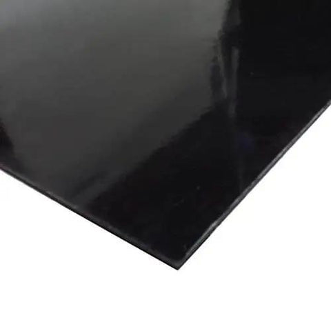 Close-up of ABS Black Plastic Sheet 12 By 18 By One Sixteenth Inch Haircell Front Pattern, Smooth Back, for automotive repairs and DIY projects.