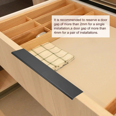Two Pack 150mm Cabinet Edge Finger Pulls Black Aluminum Alloy Back Mount Concealed Tab Handles For Hidden Drawers In Kitchen And Furniture Modern Hidden Edge Pulls With 4mm Holes And 128mm Center Spacing installed on a wooden drawer