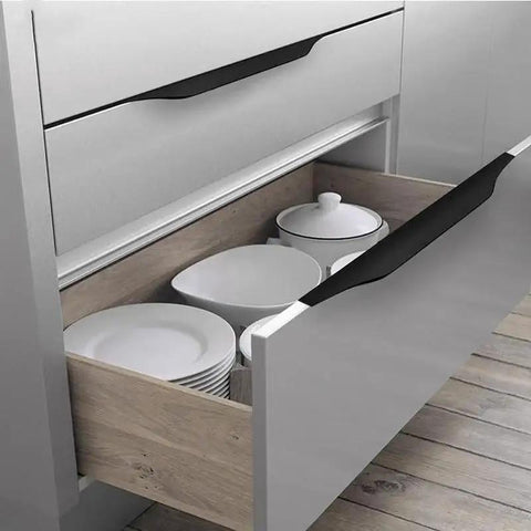 Five Pack Concealed Finger Pulls for Cabinets and Drawers in Black Aluminum, Long Edge Tab Pulls, installed on kitchen drawer