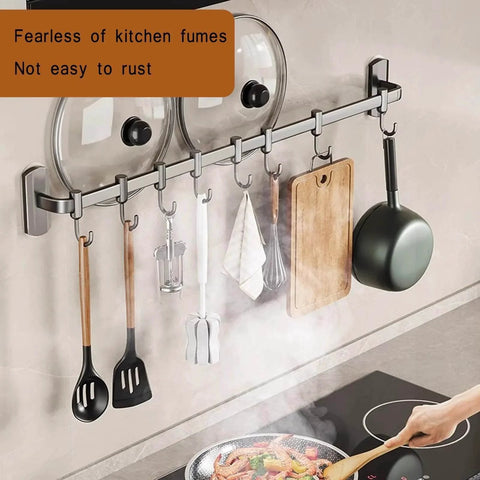 Kitchen Hooks Utensil Holder Wall Utensil Rack with pots, pans, and utensils hanging on a 45cm black aluminum rail above a stovetop.