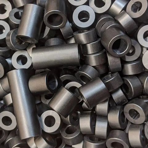 Black anodized aluminum spacers delivering precise, corrosion resistant mounting with 3/4 inch outer diameter and 3/8 inch bore