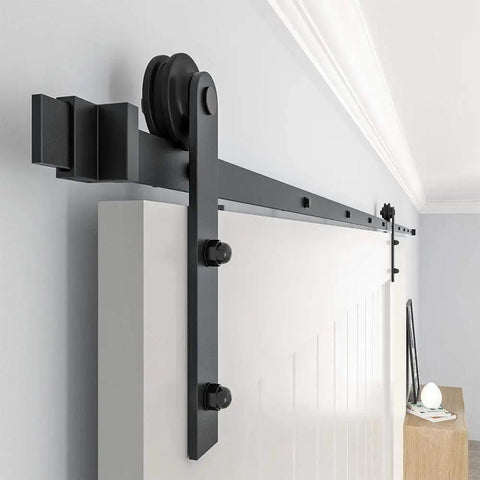 10 Foot Barn Door Hardware Kit For Single Sliding Door Heavy Duty Black Carbon Steel Track And J Shape Rail Includes All Necessary Hardware For Quick Smooth Installation For A 65 Inch Closet Panel No Door installed side view