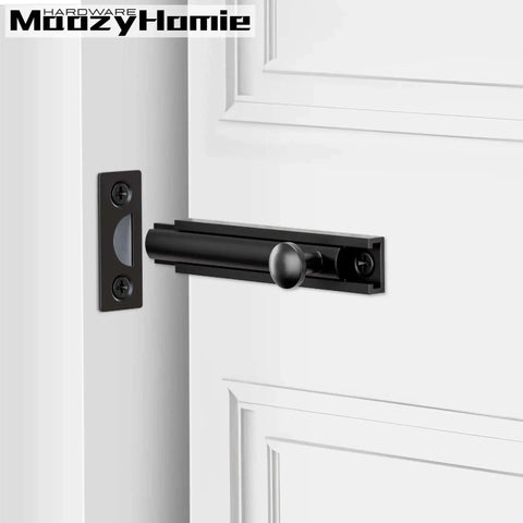 3 Inch Solid Brass Surface Bolt Beefy Built Heavy Duty Concealed Sliding Door Bolt Latch installed on white door, black finish