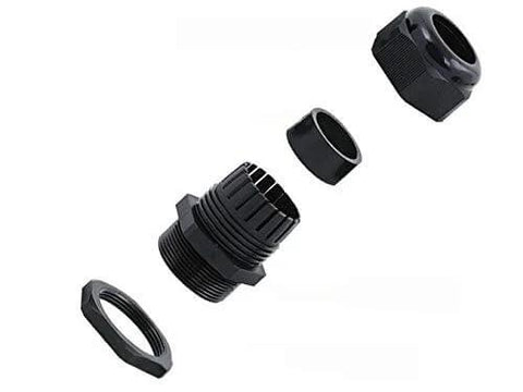 Exploded view of a black plastic cable gland with four separate components including nut, washer, body, and gland seal