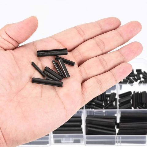 Hand holding 25Pcs 3/32" x1/2" Slotted Spring Pins Carbon Steel Split Expansion Pin Roll Pin Assortment for Home Repair, Black