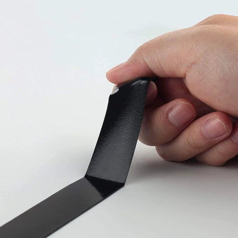 Hand holding Heavy Duty Waterproof Double Sided Foam Mounting Tape Half Inch By Eighteen Feet Black For Home Office Car And LED Strip Lights