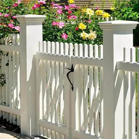 Self Locking Gate Latch Built Tough For Wooden Fences And Gates With 9 Inch Gate Handle Heavy Duty Gate Latch installed on a white garden gate.