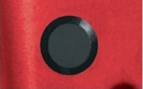 50 Piece Flush Mount Black Hole Plug Kit For Auto Body And Sheet Metal, installed in red metal surface.