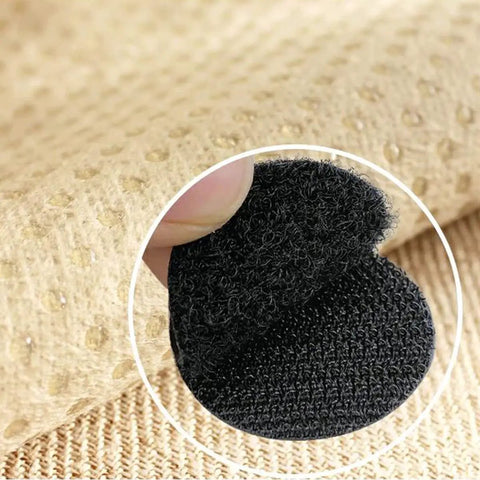 Close-up of One Inch Round Hook And Loop Dots Self Adhesive Fasteners 24 Pairs Double Sided Nylon Sticky Dots Black on fabric