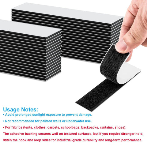 Hand holding 32 Sets 1x4 Inch Hook And Loop Strips With Adhesive Heavy Duty Mounting Strips For Wall Hanging Pictures Remote Controls Black