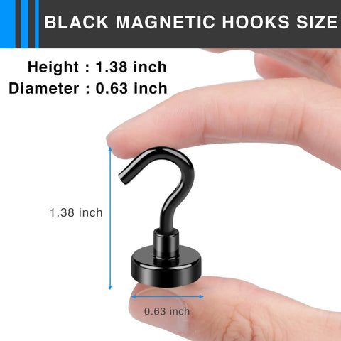 Black magnetic hook held between fingers, showing dimensions 1.38 inch height and 0.63 inch diameter, used for hanging items.