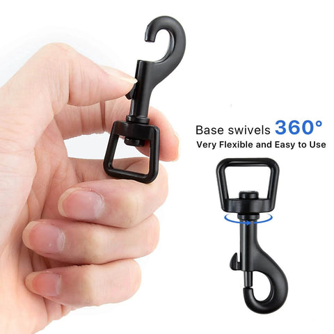 Hand holding metal heavy duty swivel snap hook, black zinc alloy, 360-degree rotation, part of 20Pcs Bolt Snap Hooks Set For Dog Leash Clips And DIY Projects.