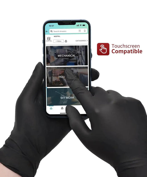 Six Mil Black Nitrile Gloves Textured Grip Latex Free Powder Free XL 100 Count holding smartphone, touchscreen compatible