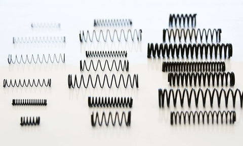 114 Piece Black Oxide Finish Compression Spring Assortment With 29 Sizes In A PP Storage Case Including Chart On Lid For Quick Identification Pro Grade Spring Steel Factory Direct For Tough Mechanical Projects