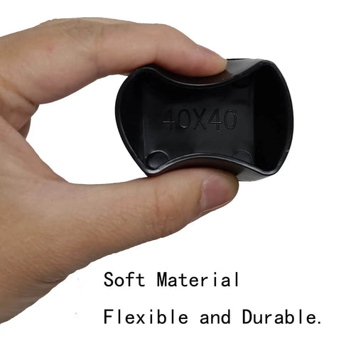 Person holding a Black PVC square end cap for 1-5/8 inch strut channels; durable, flexible protection, shown in close-up view.
