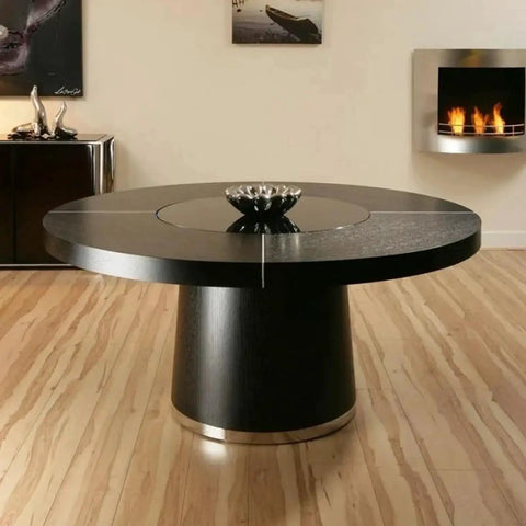 Black round table with sleek design in modern living room setting
