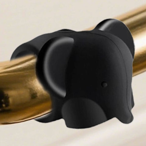 Side view of black silicone cartoon stopper from Door Knob Protector Wall Mounted Silicone Cartoon Stopper Bumper Cushion Shield for Home Bedroom Living Room and Office Protects Walls from Dents Scratches and Scuffs While Adding Cute Decorative Charm, mounted on a metal rod.